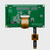 Backside of a green OLED module PCB showcasing various components, the 1x20 thru hole connection points, and a FPC cable for the capacitive touchscreen.