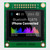 Front view of a 1.8-inch OLED display on a green PCB, showing a full-color 160x128 pixel audio transmitter readout.