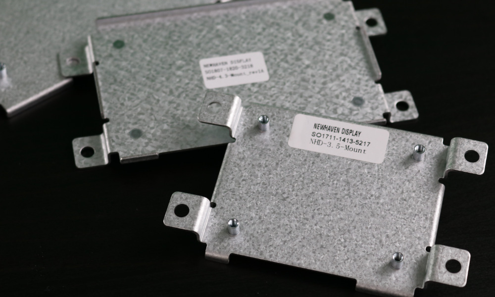 Threaded standoffs on an electronic display