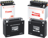 Yuasa YTX20HL-BS-PW YUAM620BH-PW maintenance-free marine AGM battery showing its rugged black poly-propylene casing with a black top layout, featuring flush-mounted lead terminal blocks with left-side positive and right-side negative orientation, displayed next to its un-opened 0.93-liter clear plastic electrolyte acid pack and stainless steel marine mounting bolts on a plain white backdrop.