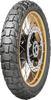 A high-resolution studio product photograph of the Dunlop Trailmax Raid front motorcycle tire in 110/80R19 59T sizing, set against a clean white background. Mounted on a gold spoked adventure motorcycle wheel with brake rotor details and shown at a three-quarter perspective, the tire highlights its rugged 50/50 dual-sport adventure tread profile engineered for mid-to-large capacity adventure touring bikes. It features aggressive blocky tread blocks with deep grooves and tie-bar bridging designed to maximize off-road grip in mud, dirt, and loose gravel while providing precise steering response, high-speed stability, and wet-weather traction on paved roads, finished across a durable matte black rubber casing.