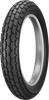 A studio product photograph of the Dunlop K180 front motorcycle tire in 130/80-19 67H sizing, isolated against a clean white background. Positioned standing upright at a three-quarter perspective, the tire showcases its classic flat-track-inspired dirt track tread design. Engineered for street trackers, scramblers, and vintage dual-sport bikes, it features aggressive block-style tread lugs arranged in a continuous pattern to provide balanced traction on hard-packed dirt and pavement, finished with clean, embossed sidewall lettering along its matte black rubber casing.