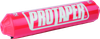 A high-resolution studio product photograph of a ProTaper Fuzion Bar Pad in Race Red, set against a clean white background. Displayed at a front-three-quarter angle, the cylindrical high-density molded foam pad features a glossy vibrant red vinyl cover, bold white "PROTAPER" block logo graphics printed across the front, sleek black molded end caps, and subtle white "FUZION" branding on the side, designed specifically for ProTaper Fuzion crossbar handlebars.