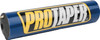 A high-resolution studio product photograph of a ProTaper Molded 8-inch Round Bar Pad in vibrant blue, set against a clean white background. Displayed at a front-three-quarter angle, the cylindrical high-density molded foam handlebar pad features a glossy bright blue vinyl cover, bold white and yellow "PROTAPER" block logo graphics printed across the front, and black molded end caps designed to fit traditional crossbar-equipped handlebars.