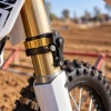 ProTaper SELA-style launch assist device installed on a motocross motorcycle front fork