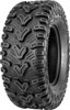 A high-resolution studio product photograph of a QuadBoss QBT448 Utility UTV tire in size 28x10-14, set against a clean white background. Displayed at a front-three-quarter angle, the heavy-duty utility UTV tire features an aggressive multi-surface tread pattern with deep lug spacing for mud dispersion and extended shoulder lugs for enhanced sidewall protection and cornering bite. Constructed with a 6-ply rated carcass, the durable black rubber casing displays crisp embossed sidewall text including "QUADBOSS", "QBT448", and "28x10-14".