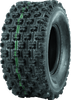 A high-resolution studio product photograph of a QuadBoss QBT739 Series ATV tire in size 22x11-10, set against a clean white background. Displayed at a front-three-quarter angle, the wide rear sport/utility off-road tire features a knobby, non-directional tread design with spaced center blocks and reinforced shoulder lugs built for traction on hard-pack and loose terrain. Constructed with a 4-ply rated casing, the durable black rubber tire displays crisp embossed sidewall text including "QUADBOSS", "QBT739", and "22x11-10".