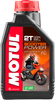 A studio product photograph of a 1-liter bottle of Motul Scooter Power 2T 100% Synthetic engine oil, set against a clean white background. Standing upright at a front-facing angle, the sleek black plastic container features side grip contours and a red twist-off cap. The front label displays a dark panel featuring a modern sport scooter rider graphic alongside the vertical white "MOTUL" logo set on a bold red banner, paired with crisp orange and white "2T", "SCOOTER POWER", "100% SYNTHETIC", "ESTER", "FD", and "ANTI-SMOKE" callouts.