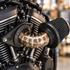 Vance & Hines VO2 Falcon stainless steel air intake installed on a V-twin motorcycle