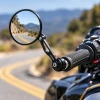 CRG Hindsight EXO LS round left mirror mounted on a motorcycle handlebar
