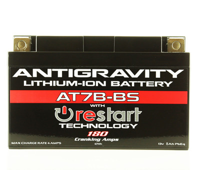 Antigravity Batteries AG-AT7B-BS-RS lithium RE-START engine starting battery built inside a compact matte-black YT7B-BS OEM size case layout, highlighting its distinct top-mounted 4-terminal block setup and casing reset button, shown next to its accompanying wireless remote keyfob and hardware bolts against a clean white backdrop.