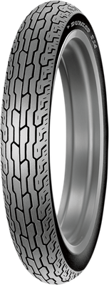 A studio product photograph of the Dunlop F24 front motorcycle tire in 100/90-19 57S sizing (Part #45812975), isolated against a clean white background. Mounted on a silver wheel, the tire is positioned vertically at a three-quarter perspective to showcase its classic OEM touring and cruiser tread design. The tire features continuous circumferential grooves along the center crown for straight-line tracking stability and efficient water dispersion, complemented by angled shoulder siping for predictable cornering control and clean, raised "DUNLOP F24" branding along its matte black rubber sidewall.