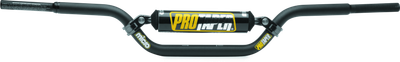 A high-resolution studio product photograph of the ProTaper Micro Schoolboy Pro Handlebar in a black finish, set against a clean white background. Displayed from a front-facing studio angle, the handlebar is precision-manufactured from high-strength 2000-series T6 aluminum alloy with a cold-forged crossbar. Tailored specifically for advancing youth racers transitioning on 65cc and 85cc mini motorcycles, it features ProTaper's specialized abrupt-taper design with reduced-diameter grip ends to allow smaller hands a firm, natural wrap for enhanced control and safety, while maintaining a standard 7/8-inch clamp and control section. The bar features knurled clutch-side tubing to prevent grip slippage, laser-etched alignment grid markings for precise positioning, and a high-density crossbar pad with signature ProTaper branding.
