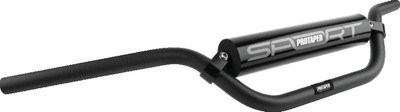 A high-resolution studio product photograph of the ProTaper ATV Aluminum Handlebar in a sleek matte black finish, set against a clean white background. Displayed from a front perspective angle, the handlebar features high-strength aerospace 2000-series T6 aluminum construction with a standard 7/8-inch diameter throughout. Designed with ATV-specific geometry offering increased rise and sweep for optimal quad ergonomics, it includes a cold-forged aluminum crossbar, stainless steel hardware, and a high-density vinyl-covered crossbar pad with signature ProTaper branding.
