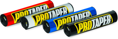 A high-resolution studio product photograph of a ProTaper Molded 10-inch Round Bar Pad in Black, set against a clean white background. Displayed at a front-three-quarter angle, the full-size 10-inch cylindrical high-density molded foam pad features a glossy black vinyl cover, bold yellow and white "PROTAPER" block logo graphics enclosed in a yellow outline across the front, and durable black molded end caps designed for full-size crossbar handlebars.