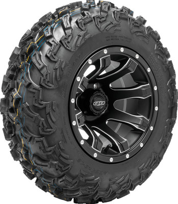 A high-resolution studio product photograph of a QuadBoss QBT447 Utility ATV/UTV tire in size 24x8-12, set against a clean white background. Displayed at a front-three-quarter angle, the heavy-duty front all-terrain utility tire features a non-directional tread design with multi-angled lugs that provide excellent traction on hardpack, mud, and loose trail surfaces. Constructed with a durable 6-ply rated bias carcass, the black rubber casing displays crisp embossed sidewall text including "QUADBOSS", "QBT447", and "24x8-12".