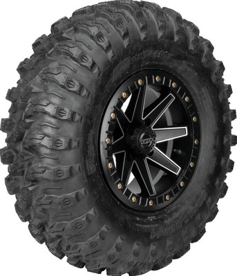 A high-resolution studio product photograph of a QuadBoss QBT446 Radial Utility UTV tire in size 30x10R14, set against a clean white background. Displayed at a front-three-quarter angle, the heavy-duty radial all-terrain utility UTV tire features a non-directional, multi-surface tread design with tight center lugs for a smooth ride on hardpack and wrapped shoulder lugs for aggressive side-bite and cornering control. Constructed with an 8-ply rated radial carcass, the durable black rubber casing displays crisp embossed sidewall text including "QUADBOSS", "QBT446", and "30x10R14".