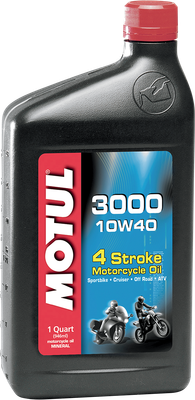 A studio product photograph of a 1-liter bottle of Motul 3000 4T Mineral engine oil in SAE 10W-40 viscosity, set against a clean white background. Standing upright at a front-facing angle, the black plastic container features side grip contours and a red twist-off cap. The distinct front label displays a dark panel featuring a street motorcycle graphic alongside the vertical white "MOTUL" logo set on a bold red banner, paired with crisp blue and white "3000", "4T", "10W-40", "MINERAL", and "1L" callouts.