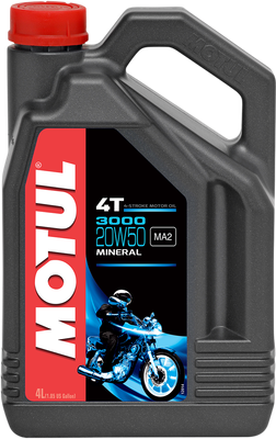 A high-resolution studio product photograph of a bulk 4-liter (1.05 US gallon) container of Motul 3000 4T Mineral Engine Oil in 20W-50 viscosity, set against a clean white background. Standing upright at a front-facing angle, the heavy-duty matte black plastic jug features a red twist-off cap, an ergonomic integrated carrying handle, and molded side grips. The vibrant red, black, and blue label clearly displays the bold white "MOTUL" logo alongside "3000", "20W50", "4T 4-STROKE MOTOR OIL", and "MINERAL" text, certified with JASO MA2 specifications and illustrated with a dynamic motorcycle graphic, engineered to deliver high-temperature protection, shear stability, and optimal wet-clutch engagement for four-stroke motorcycle engines operating under high loads.