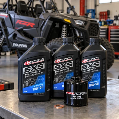 Maxima SXS 10W-50 Polaris oil change kit displayed in a UTV workshop