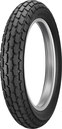 A high-resolution studio product photograph of the Dunlop K180 rear motorcycle tire in 120/90-18 65P sizing, isolated against a solid white background. Positioned standing vertically at a three-quarter perspective, the tire highlights its distinct flat-track and dirt-tracker inspired tread design. Popular on street trackers, scramblers, and custom vintage builds, it features tightly packed, block-style tread lugs arranged in a continuous pattern to offer dependable multi-surface traction on both paved roads and hard-packed dirt, finished with crisp embossed "K180" branding along its matte black rubber sidewall.