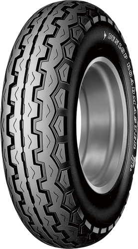 A studio product photograph of the Dunlop TT100-K81 front and rear vintage motorcycle tire in 4.25/85-18 64H sizing, isolated against a solid white background. Positioned standing vertically at a three-quarter perspective, the tire highlights its iconic classic tread design derived from Dunlop's historic Isle of Man TT racing heritage. Featuring a distinctive trigonal profile with deep interlocking directional tread grooves, it delivers progressive lean control, effective water channeling, and vintage aesthetics suited for classic, cafe racer, and retro motorcycles, completed by crisp "DUNLOP K81" sidewall lettering along its matte black rubber casing.