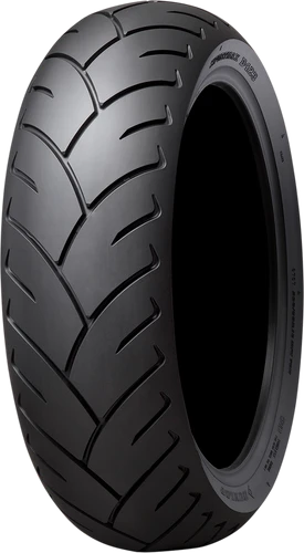 A high-resolution studio product photograph of the Dunlop D423 rear cruiser and touring motorcycle tire in 200/55R16 77H sizing, isolated against a seamless white studio background. Positioned standing vertically at a three-quarter perspective, the tire features a wide radial contact patch optimized for heavy metric cruisers and touring bikes. Its tread pattern utilizes long, directional lateral grooves designed for effective water displacement in wet conditions and smooth straight-line tracking, complemented by robust shoulder areas for cornering stability and crisp, embossed sidewall lettering along its matte black rubber casing.