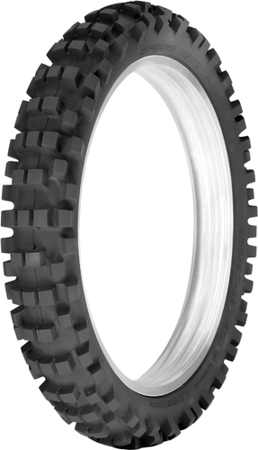 A high-resolution studio product photograph of the Dunlop D952 rear off-road motorcycle tire, isolated against a seamless, solid white studio background. The tire is standing vertically at a three-quarter angle to highlight its durable intermediate-terrain block layout. The aggressive tread pattern features prominent, wide-spaced center knobs and reinforced shoulder lugs designed to maximize grip, wear resistance, and mud clearing, framed by a matte black rubber sidewall with clean, raised "DUNLOP" and "D952" branding along the perimeter.