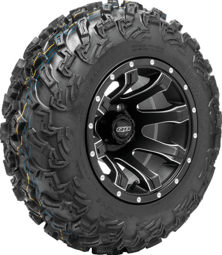 A high-resolution studio product photograph of a QuadBoss QBT447 Utility ATV/UTV tire in size 24x8-12, set against a clean white background. Displayed at a front-three-quarter angle, the heavy-duty front all-terrain utility tire features a non-directional tread design with multi-angled lugs that provide excellent traction on hardpack, mud, and loose trail surfaces. Constructed with a durable 6-ply rated bias carcass, the black rubber casing displays crisp embossed sidewall text including "QUADBOSS", "QBT447", and "24x8-12".