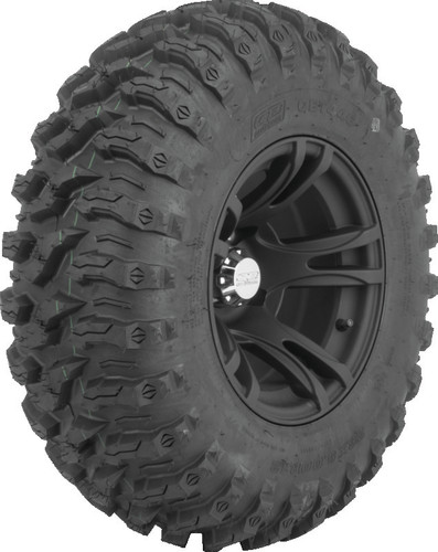 A high-resolution studio product photograph of a QuadBoss QBT446 Radial Utility ATV/UTV tire in size 26x9R12, set against a clean white background. Displayed at a front-three-quarter angle, the heavy-duty front radial all-terrain utility tire features a non-directional, multi-surface tread design with tight center lugs for a smooth ride on hardpack and wrapped shoulder lugs for aggressive side-bite and cornering control. Constructed with an 8-ply rated radial carcass, the durable black rubber casing displays crisp embossed sidewall text including "QUADBOSS", "QBT446", and "26x9R12".
