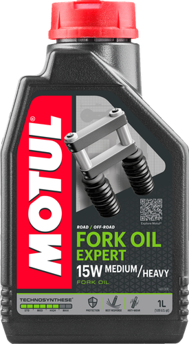 A high-resolution studio product photograph of a 1-liter bottle of Motul Fork Oil Expert Technosynthese hydraulic fluid in 15W Medium/Heavy viscosity, set against a clean white background. Standing upright at a front-facing angle, the ergonomic black plastic bottle features side grip ridges and a red twist-off cap. The front label displays the vertical white "MOTUL" logo alongside a green and white "FORK OIL EXPERT", "MEDIUM/HEAVY SAE 15W", and "TECHNOSYNTHESE" callouts with a motorcycle front fork graphic, engineered for conventional telescopic and upside-down suspension forks to provide anti-friction smoothness, seal protection, and consistent damping performance.