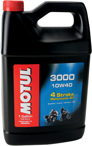 A high-resolution studio product photograph of a bulk 4-liter (1.05 US gallon) container of Motul 3000 4T Mineral Engine Oil in 10W-40 viscosity, set against a clean white background. Standing upright at a front-facing angle, the black plastic jug features an ergonomic integrated carrying handle and molded side grips. The vibrant red, black, and blue label clearly displays the bold white "MOTUL" logo alongside "3000", "10W40", "4T 4-STROKE MOTOR OIL", and "MINERAL" text, certified with JASO MA2 specifications and illustrated with a dynamic sport motorcycle graphic, engineered to provide high anti-wear protection, superior shear stability, and optimal wet-clutch engagement for four-stroke motorcycle engines.