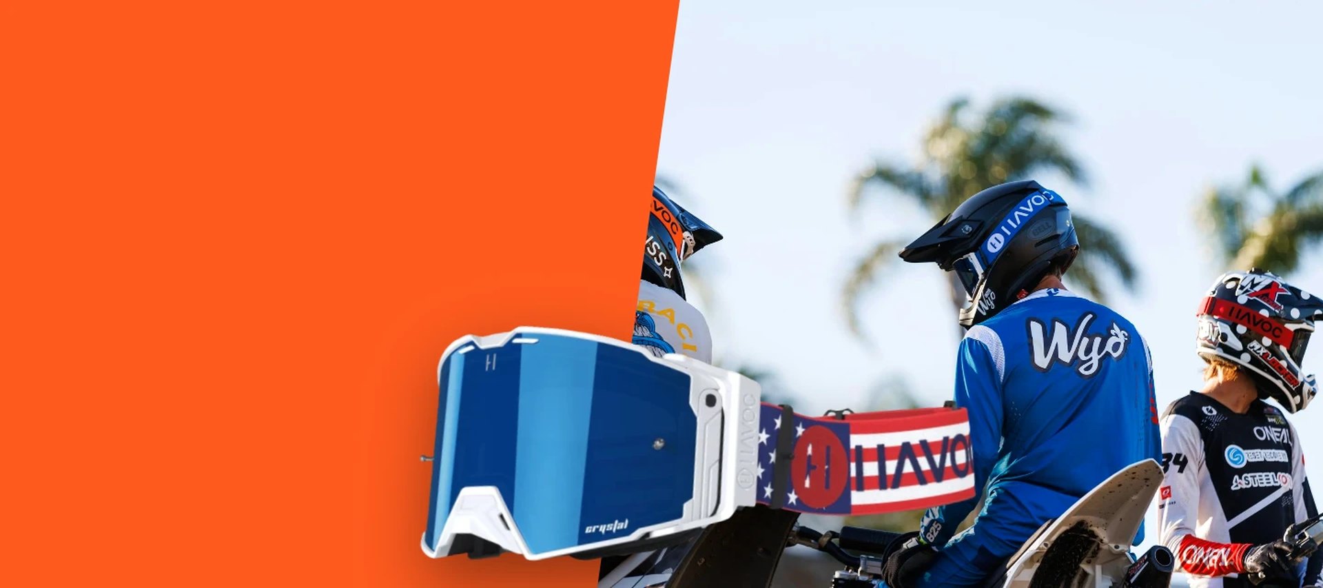 Havoc Racing Crystal goggle with the Patriot flag strap, with riders in Havoc helmets at the track