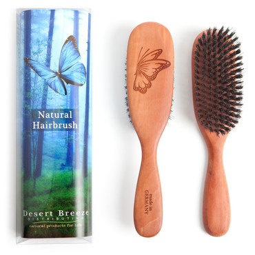 Packaging, which contains details and story about the brush, and front and back of our PW1 boar bristle hair brush with stiff bristles. Made in Germany.