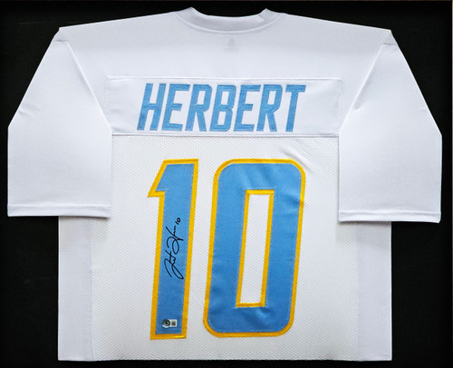 Justin Herbert Los Angeles Chargers Unsigned Powder Blue Jersey Scrambling Photograph