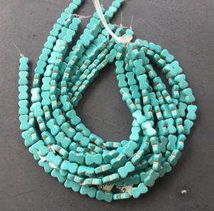 16x10mm Turquoise bone shaped Gemstone beads 16x10mm Turquoise bone shaped Gemstone beads