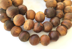 Strand of Authentic Akan handmade beads Sese wood Bicone African Trade Beads