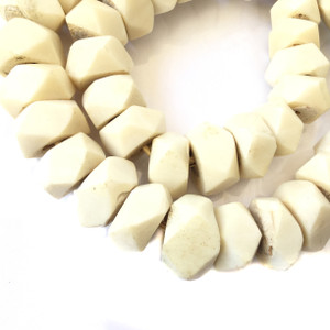 Strand of White Large Faceted Bone trade beads