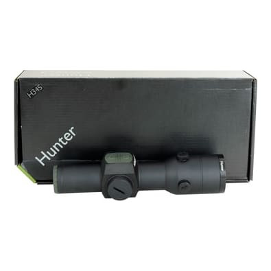 Aimpoint Hunter H34S with rings. In good condition with scuff marks on the bottom of the tube. Comes with lens cover, rings and instructions-UB614