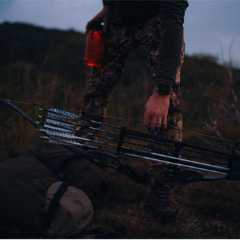 Reaching out for Victory Archery arrows while out hunting