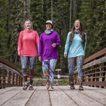 A group of women in Fishe Wear getting ready for a day of fishing