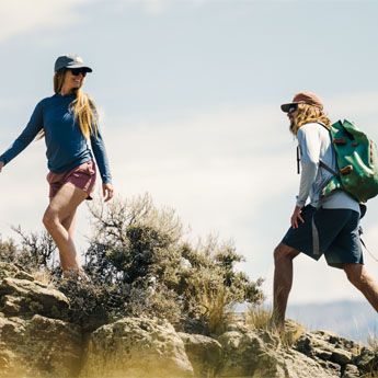 Hiking up the shoreline in Free Fly shorts