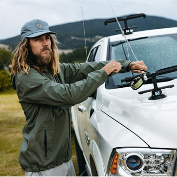 Packing up fly fishing gear in a Free Fly rain jacket