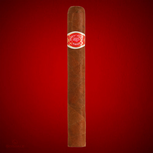 Romeo y Julieta Petit Coronas cigar on red background at Boisdale