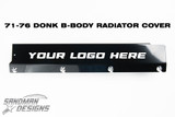Black billet radiator cover for 1971–76 B-Body donks, with sample text YOUR LOGO HERE and four mounting bolts