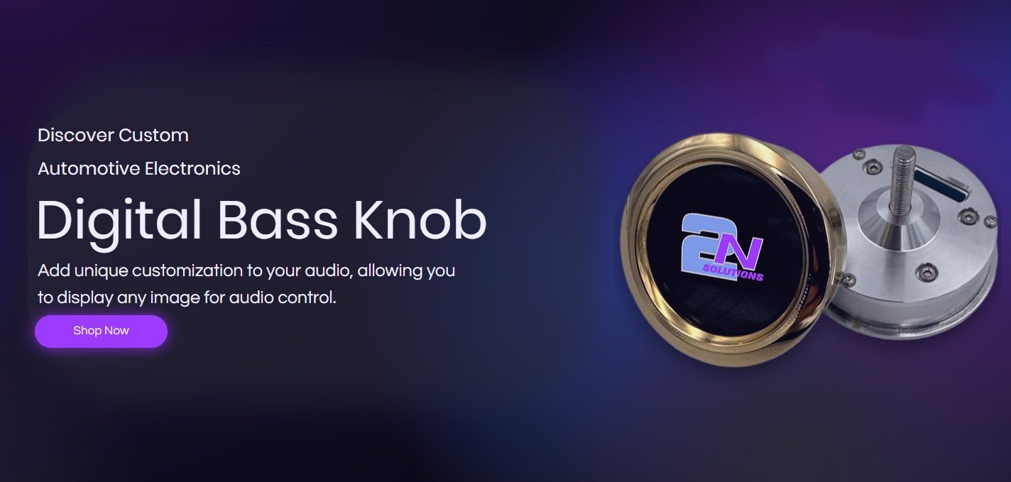 2N Solutions digital bass knob with gold bezel and a logo screen, shown beside its billet housing