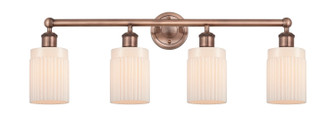 Edison Four Light Bath Vanity in Antique Copper (405|616-4W-AC-G341)