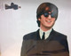 Recorte de John Lennon de cerca