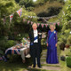 King Charles Coronation garden party scene featuring cardboard cutouts