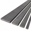 Solid carbon steel strip bars with flat faces and thin rectangular edges arranged on a white background.